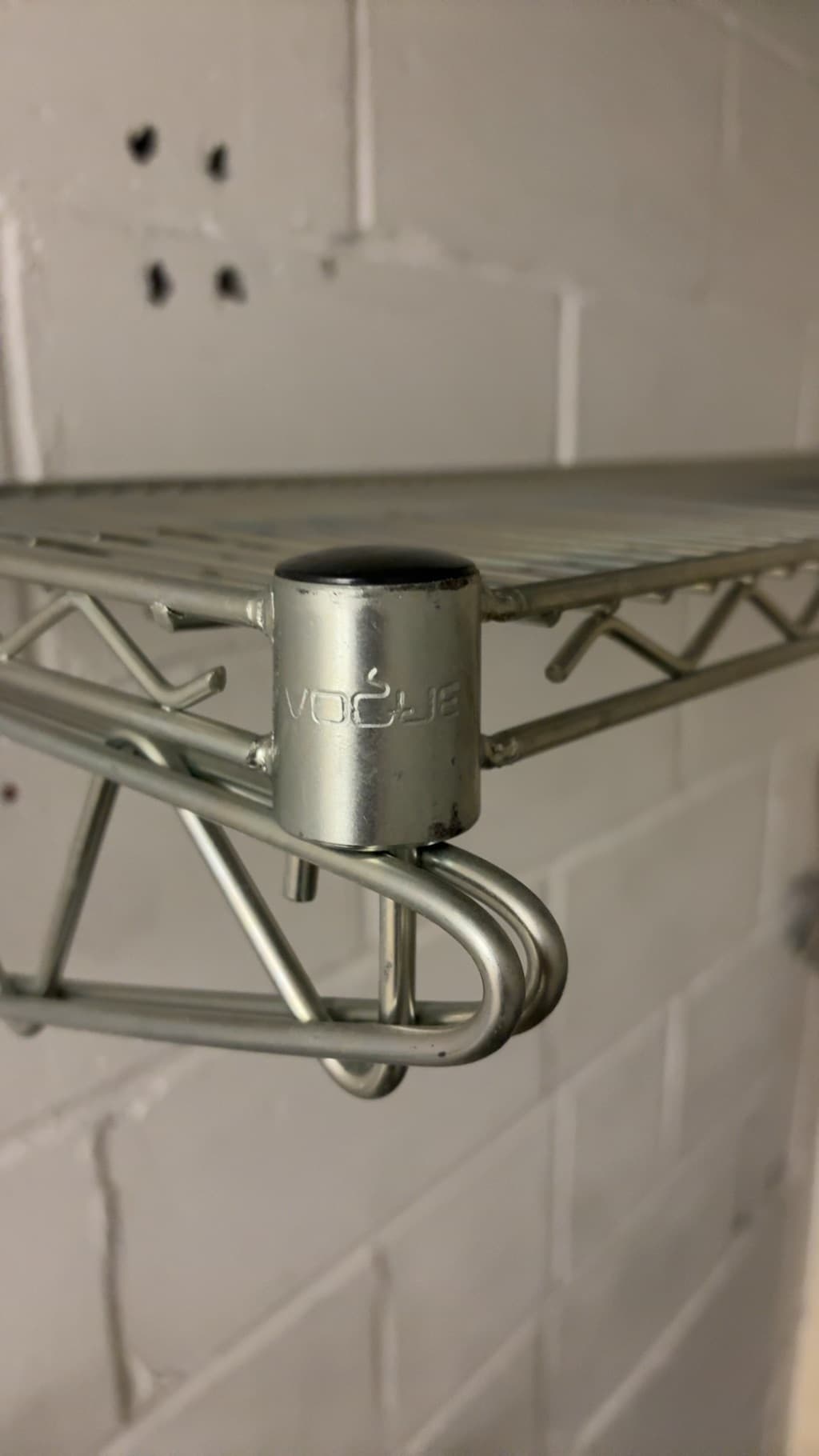 Wall-mounted metal wire shelf