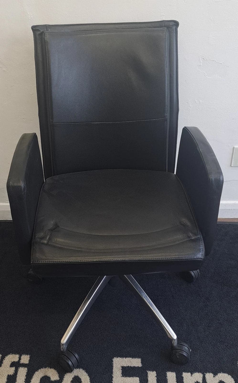 Black leather swivel meeting/breakout/operator chairs
